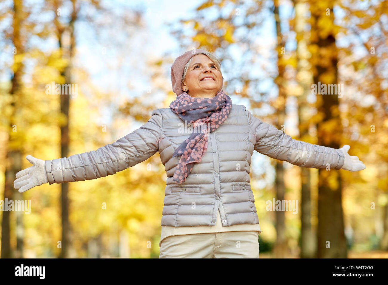 Senior woman enjoying autumn hi-res stock photography and images - Alamy