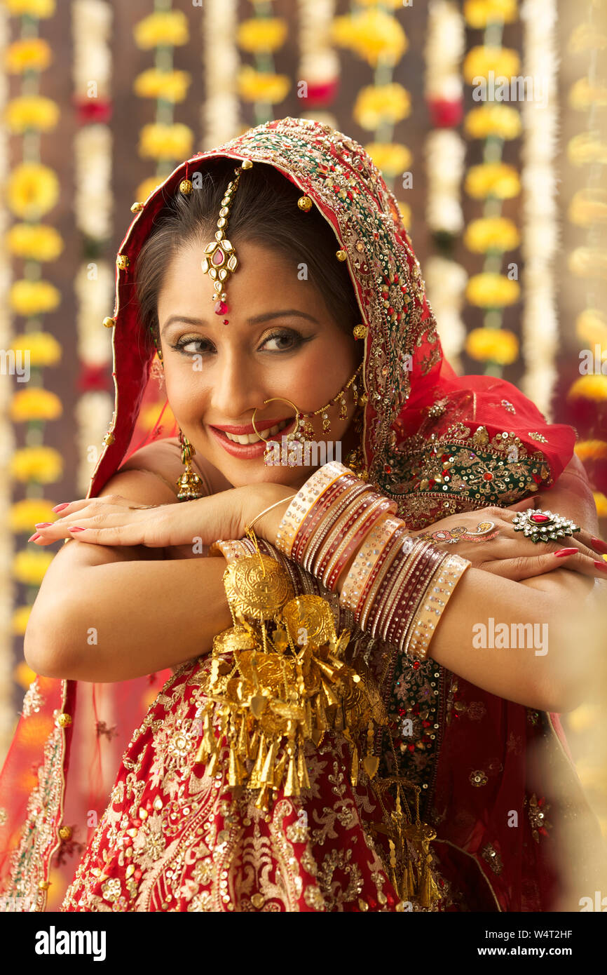 Punjabi bride smiling Stock Photo - Alamy