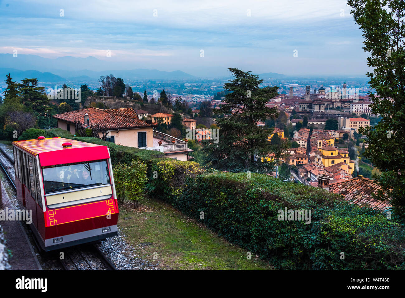 Bergamo, Italy, 21/11-18. The classic Funicolare making its way up to the hill of Castello di San Vigilio. Stock Photo