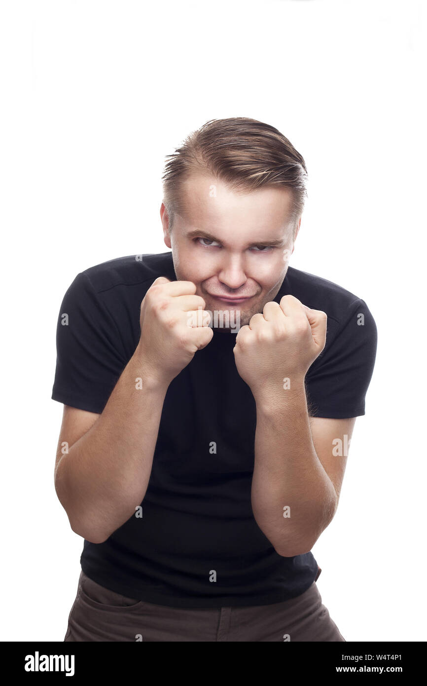 Angry young man shows boxer postition isolated od white background ...