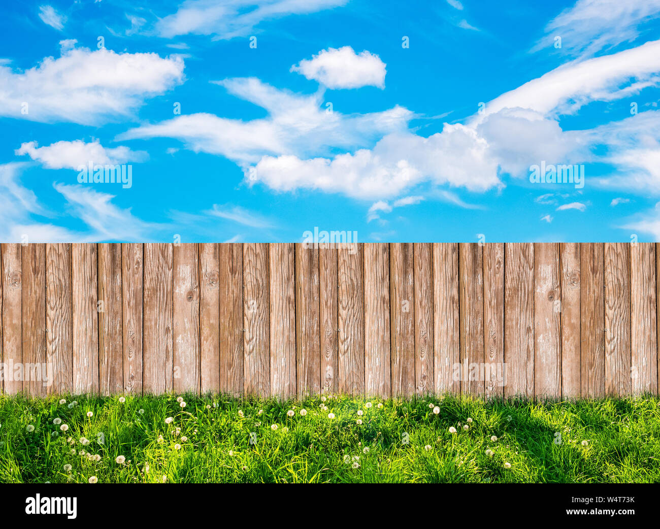 Wooden garden fence at backyard and blue sky with white clouds Stock ...