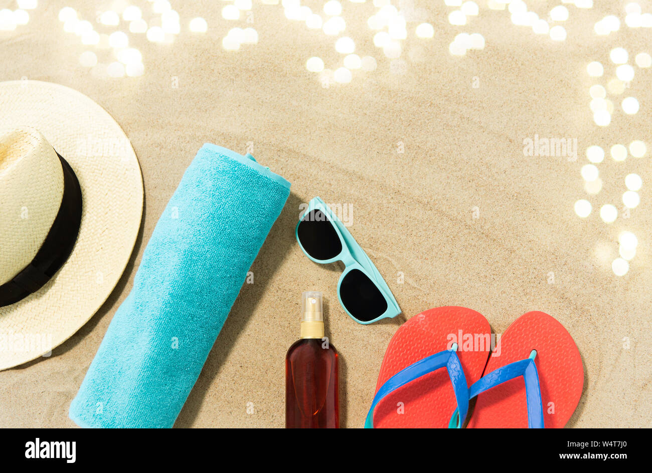 straw hat, flip flops and sunglasses on beach sand Stock Photo - Alamy