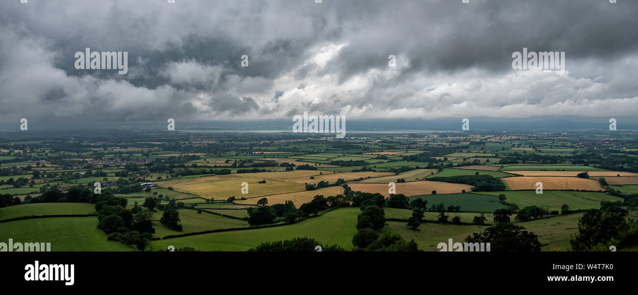 Storm clouds gather over the Severn Valley as viewed from Coaley Peak, Gloucestershire, England, United Kingdom Stock Photo