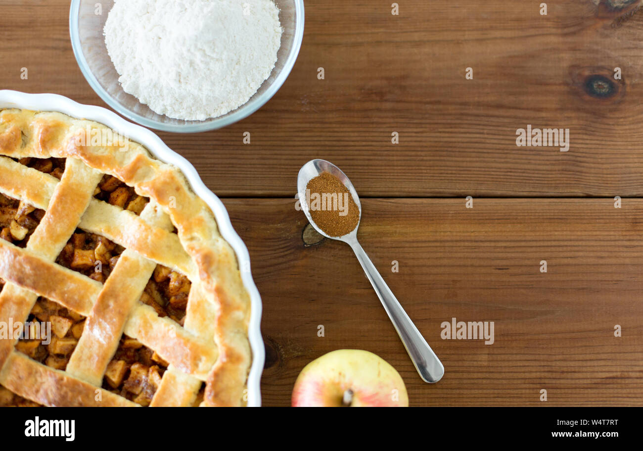 close up of apple pie on wooden table Stock Photo