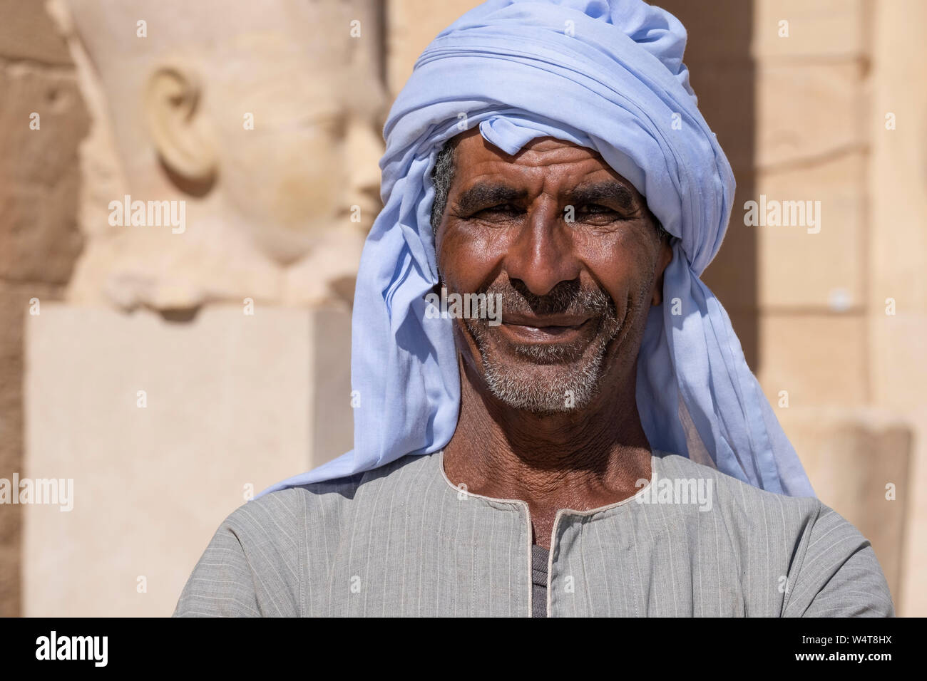 Local egyptian arab guide near temple at Luxor, Egypt. Locals offer to