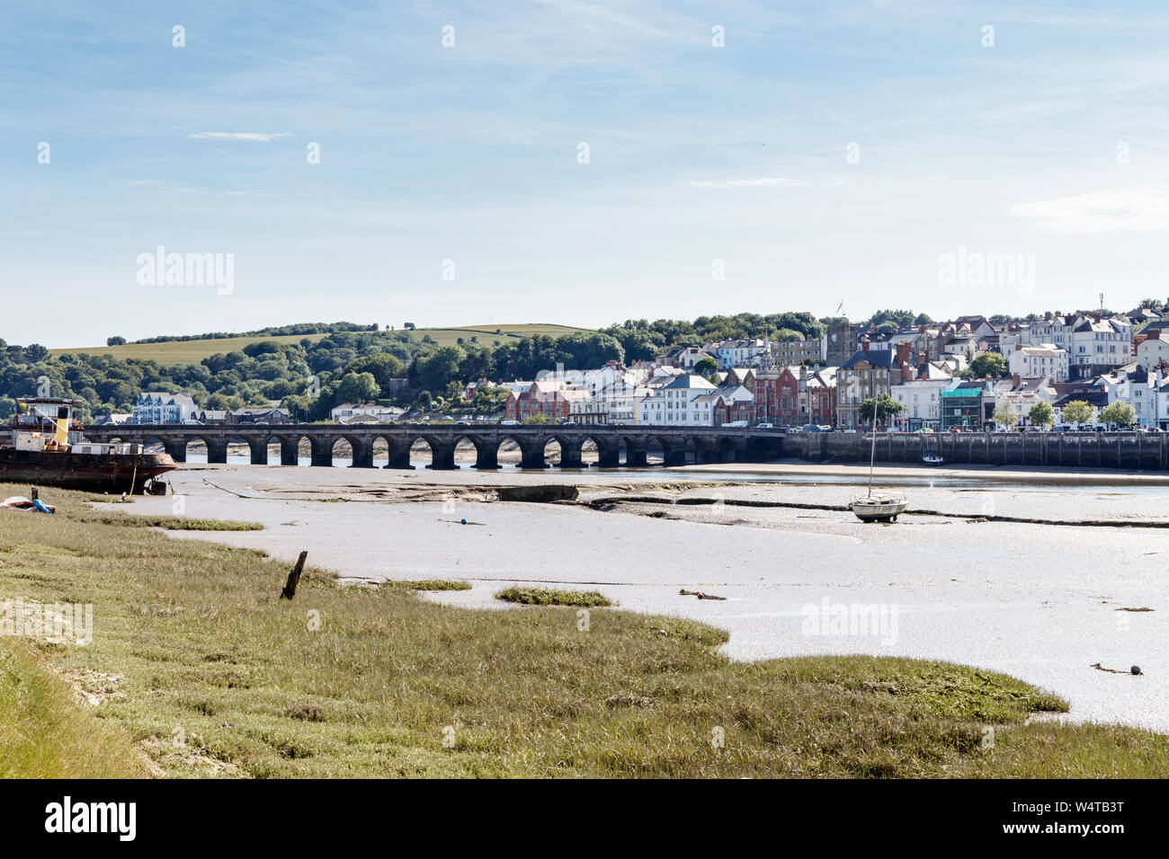 The ancient maritime town of Bideford, Devon, UK, from across the River Torridge at East The Water, the Old Bridge on the left Stock Photo