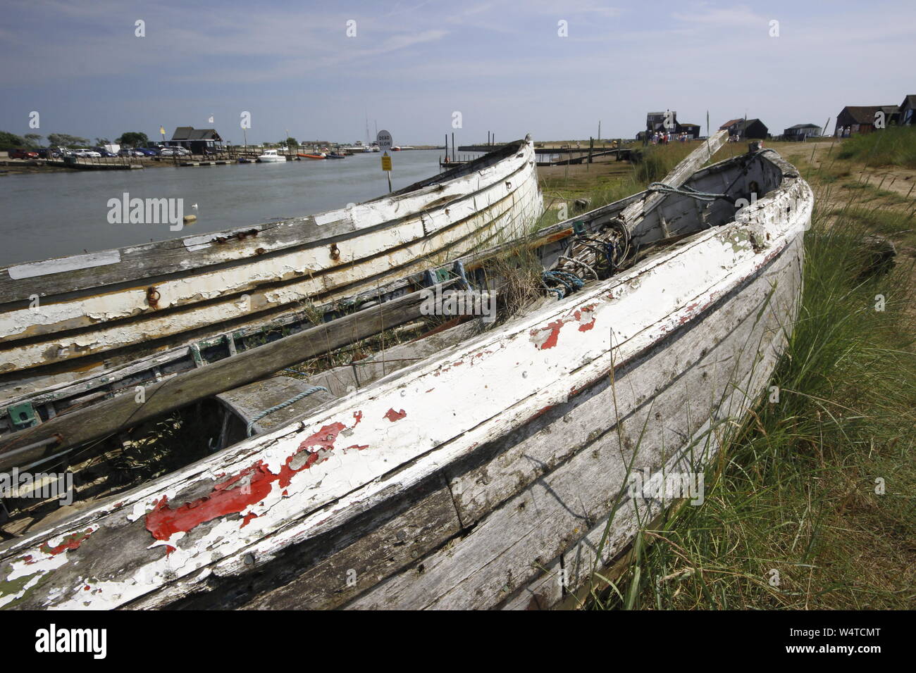 two wooden boat hulls at Walberswick on the River Blyth on the suffolk ...