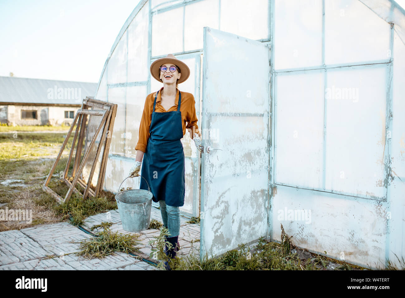 Woman farmer overalls gardening hi-res stock photography and images - Alamy