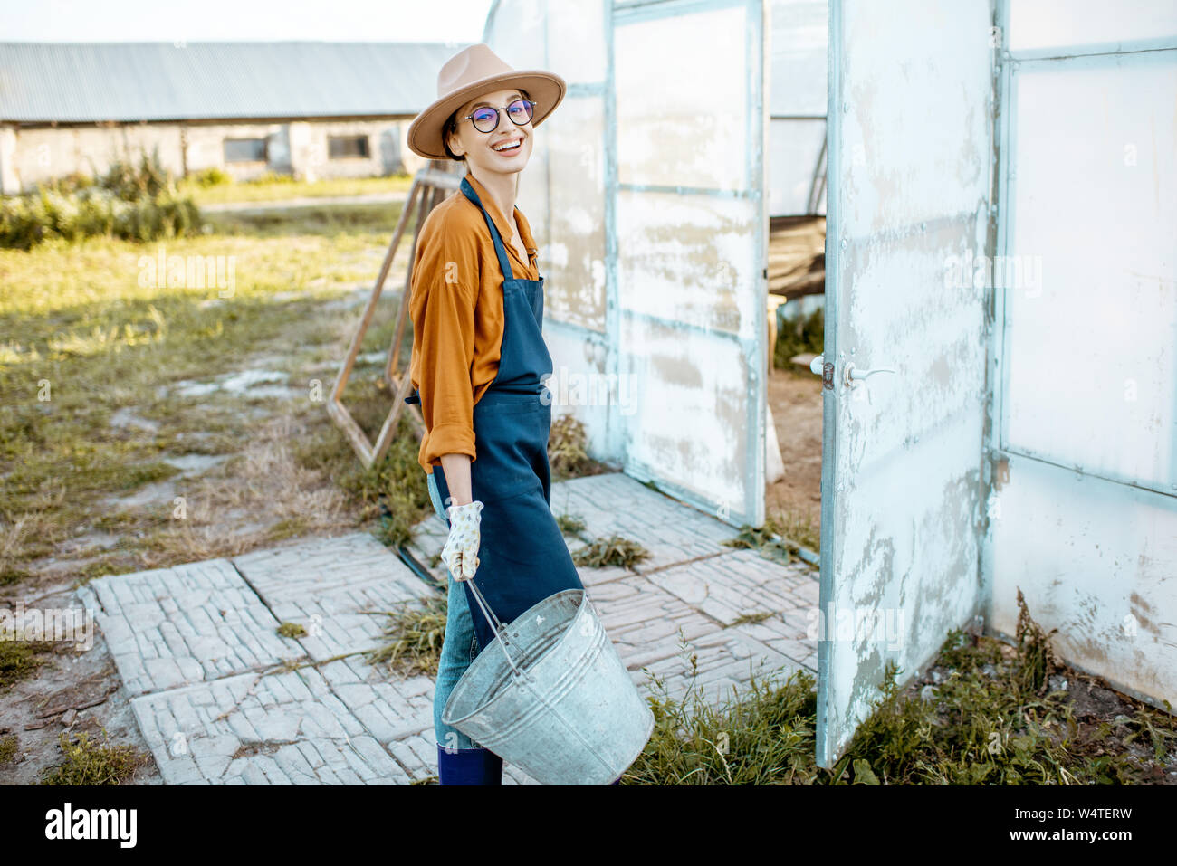 Woman farmer overalls gardening hi-res stock photography and images - Alamy