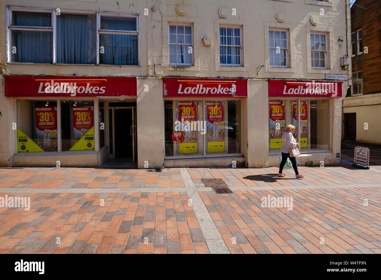 Ladbrokes betting shop in central Dumfries Scotland UK Stock Photo