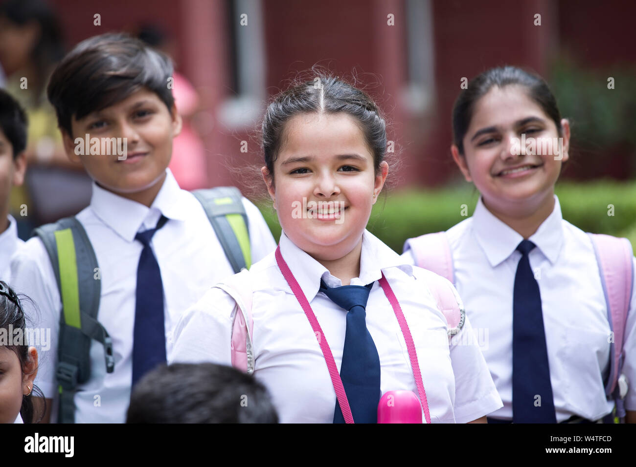 Group girls in school uniform hi-res stock photography and images - Alamy
