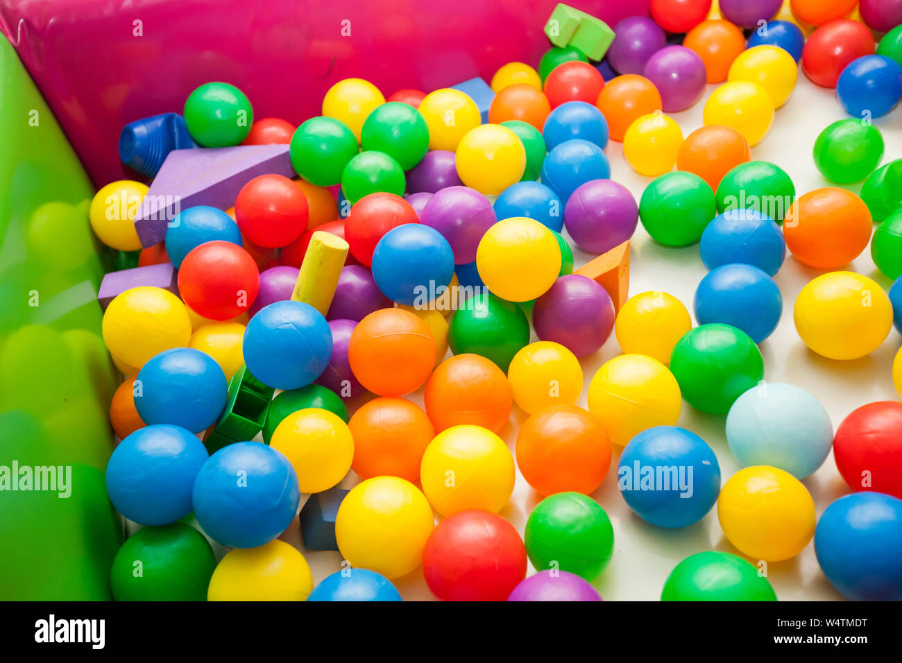Colorful play balls pool for children at indoor playground Stock Photo