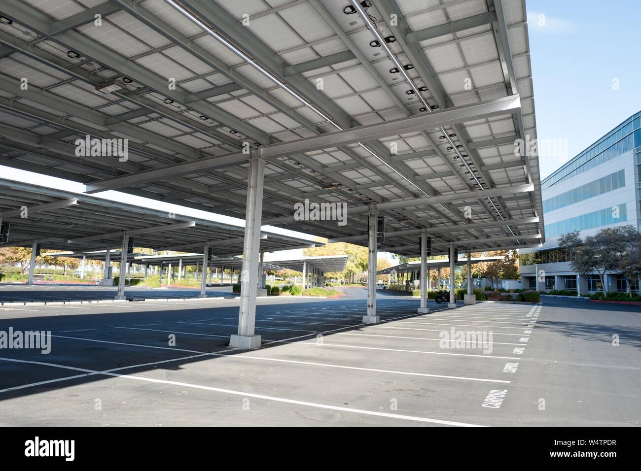 View From Below Of A Large Carport Or Parking Lot Solar Panel
