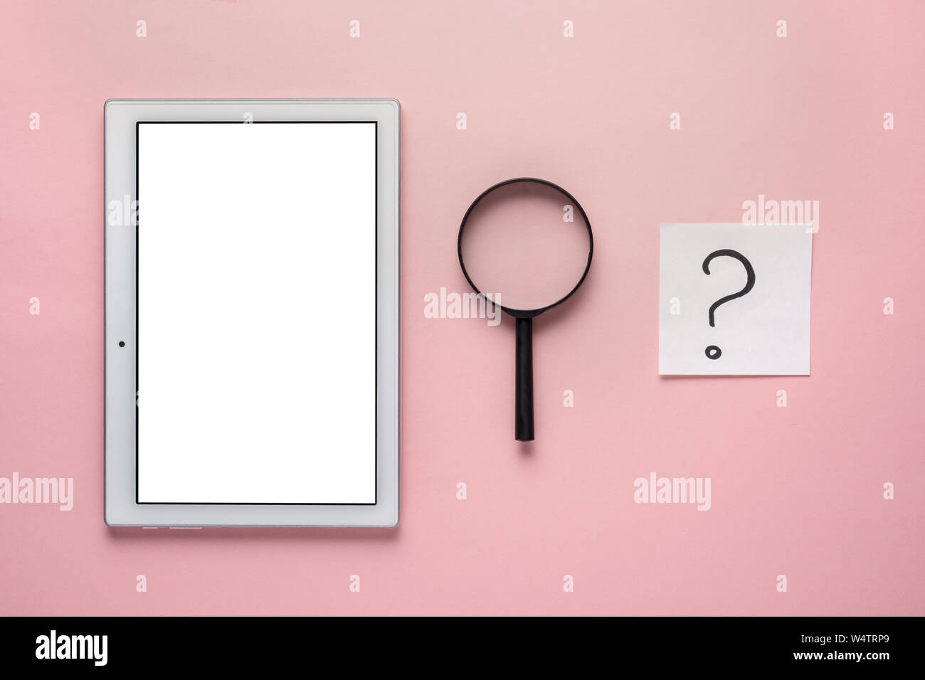 Net search. tablet with an isolated screen under the layout, magnifier ...