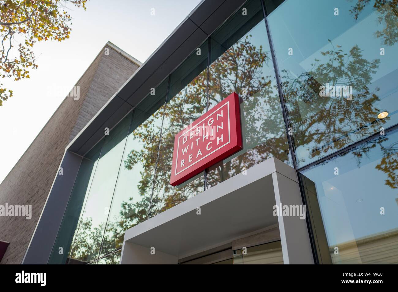 Facade with sign at Design Within Reach, a luxury furniture store providing Herman Miller and other high end office furniture to companies in the Silicon Valley town of Palo Alto, California, November 17, 2018. () Stock Photo