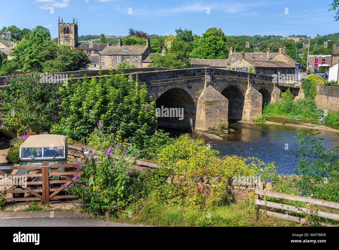 The bridge over the river Aire at Bingley in West Yorkshire. Stock Photo