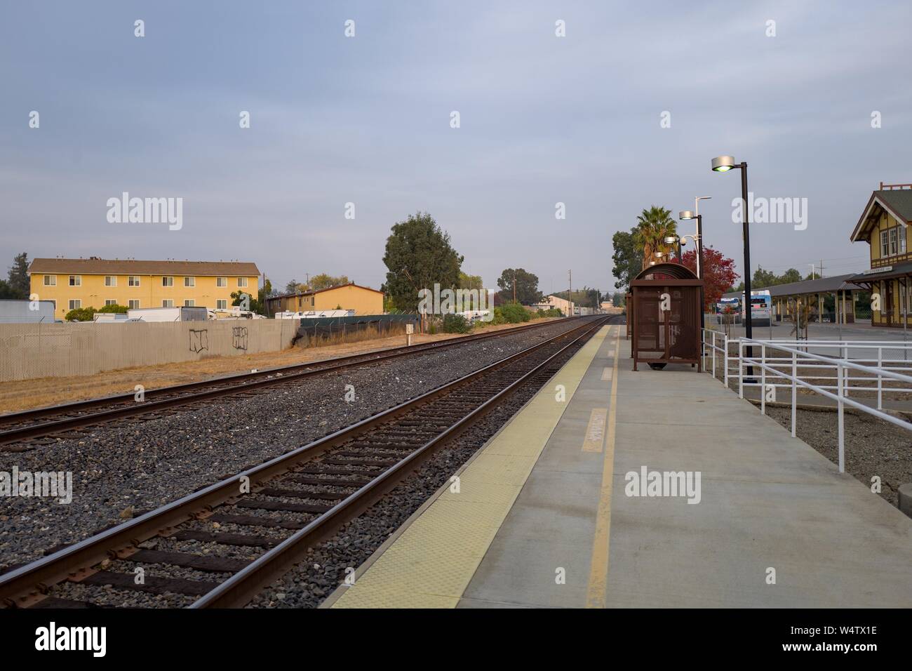 Station platform at Livermore-Lavta railroad station of the Altamont Corridor Express, a regional rail line serving Sacramento and portions of Northern California, in Livermore, California, November 19, 2018. () Stock Photo
