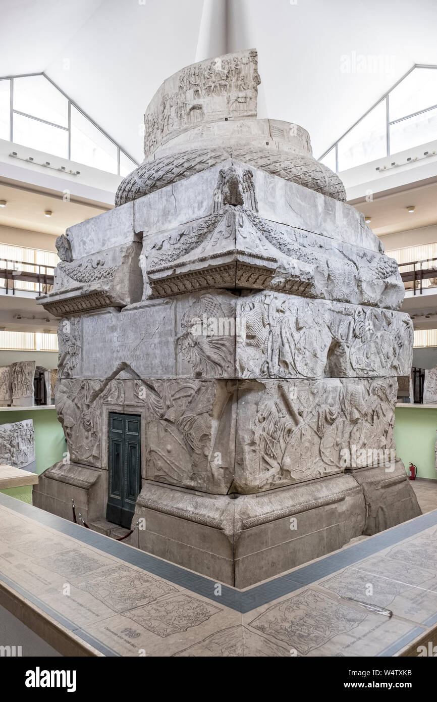 The National Museum of Romanian History in Bucharest, Romania, contains a complete 19c cast of Trajan's Column (AD 113) in segments - this is the base Stock Photo
