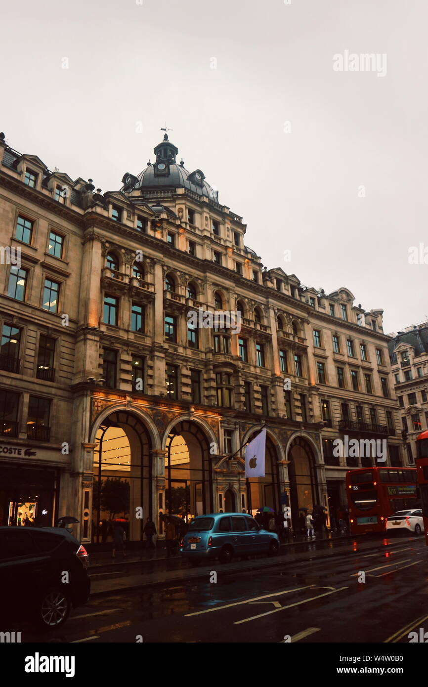 The Apple store on Regent Street on a rainy day in London, UK. Stock Photo