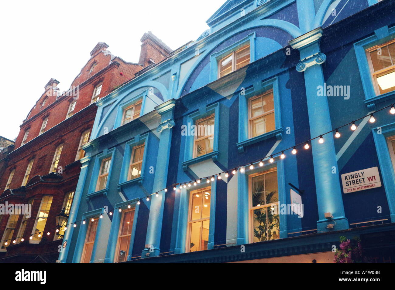 Blue colored house exterior on Kingly Street in Soho London, UK. Stock Photo