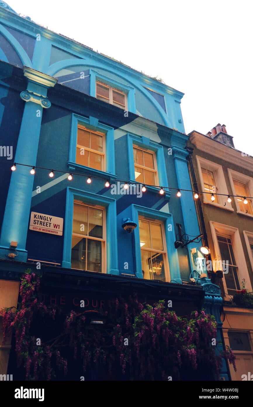 Blue colored house exterior on Kingly Street in Soho London, UK. Stock Photo