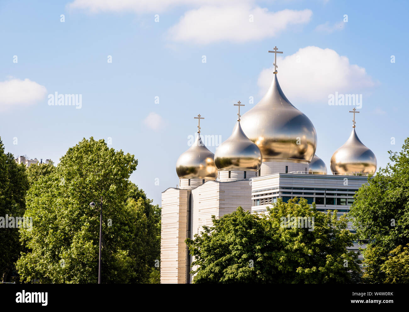 The Holy Trinity Cathedral in Paris, France, is a modern russian Orthodox cathedral, built in 2016 and topped by five golden onion domes. Stock Photo