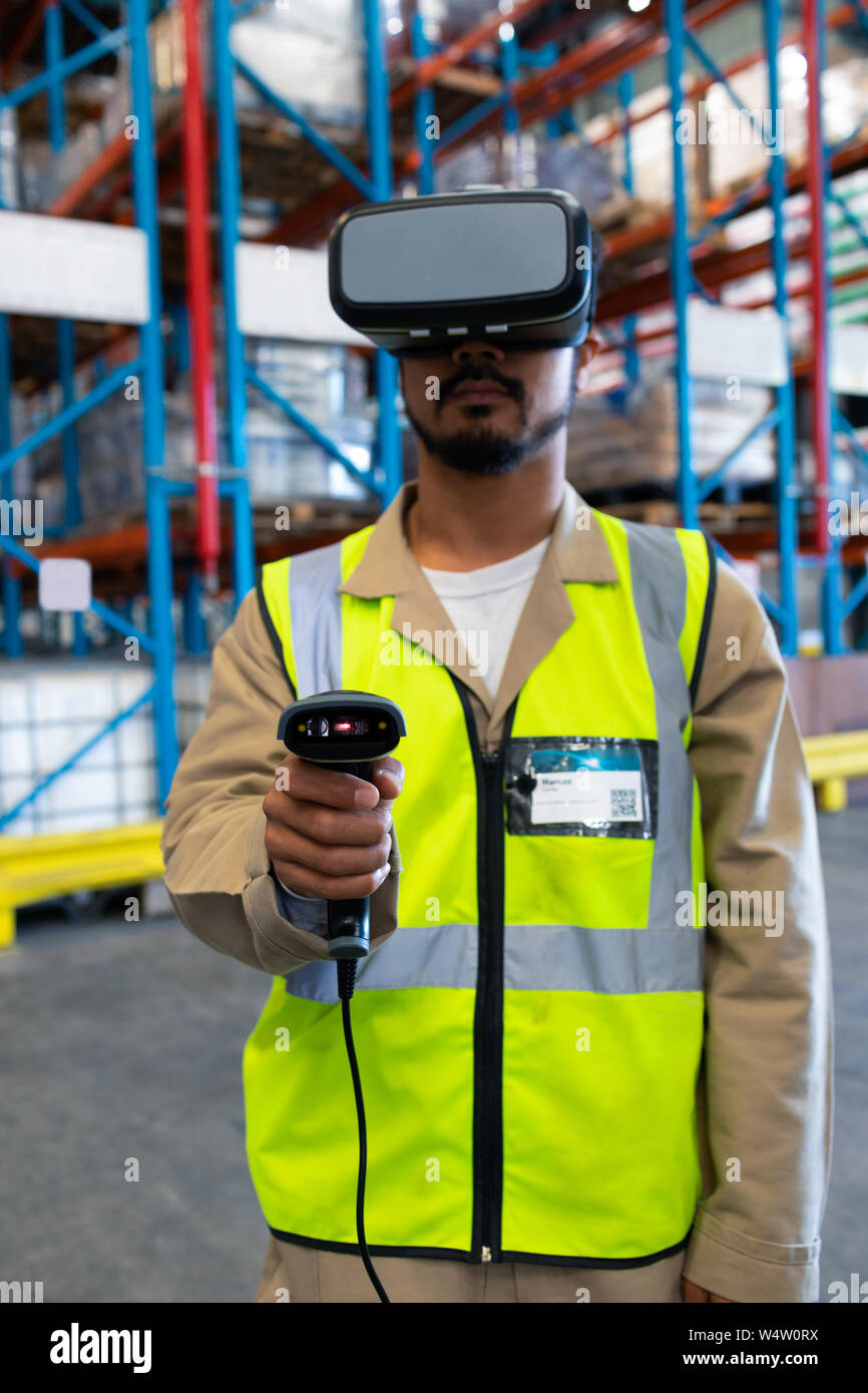 Male worker using barcode scanner hi-res stock photography and images ...