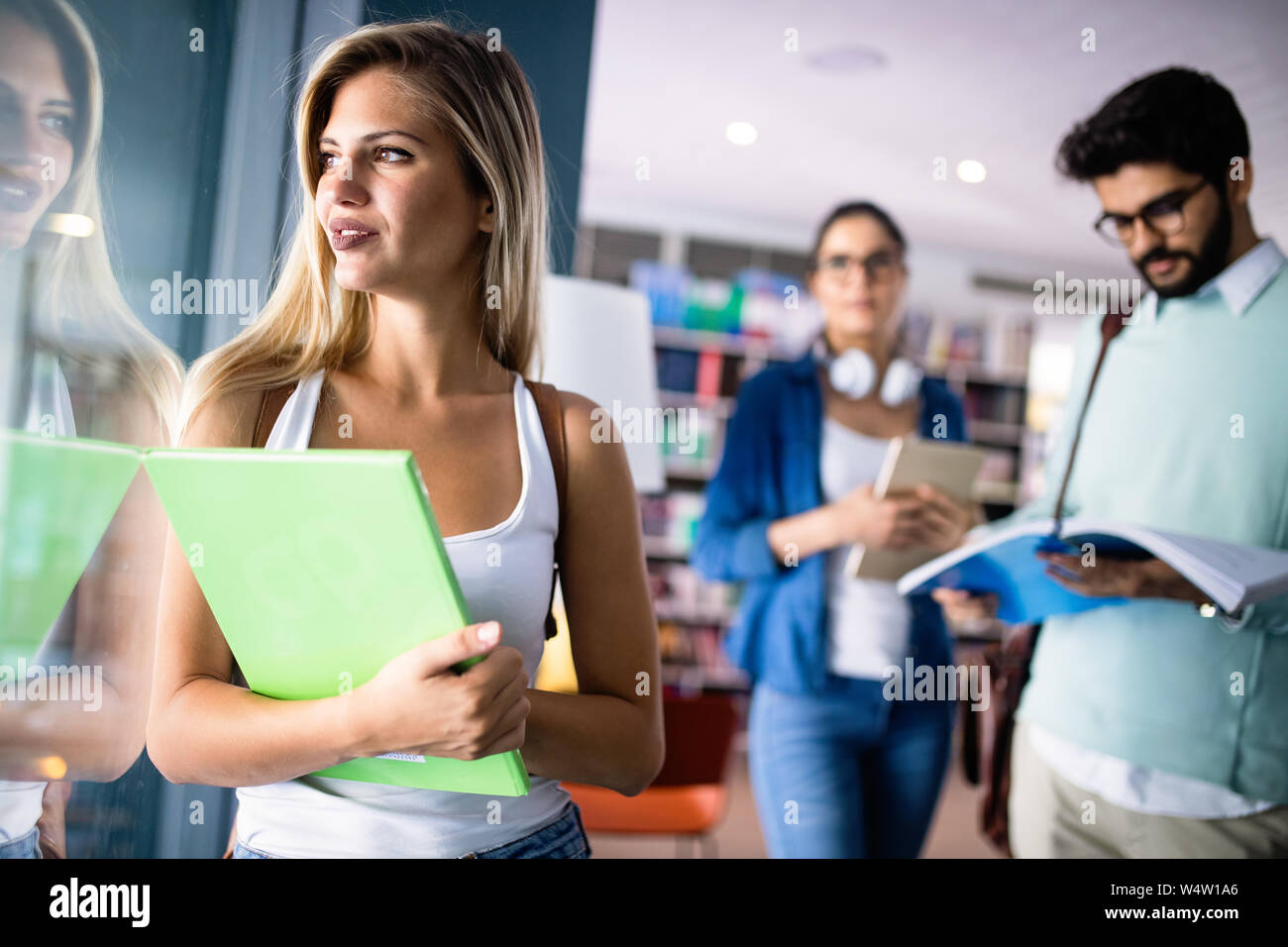 Group of friends studying together at university campus Stock Photo - Alamy