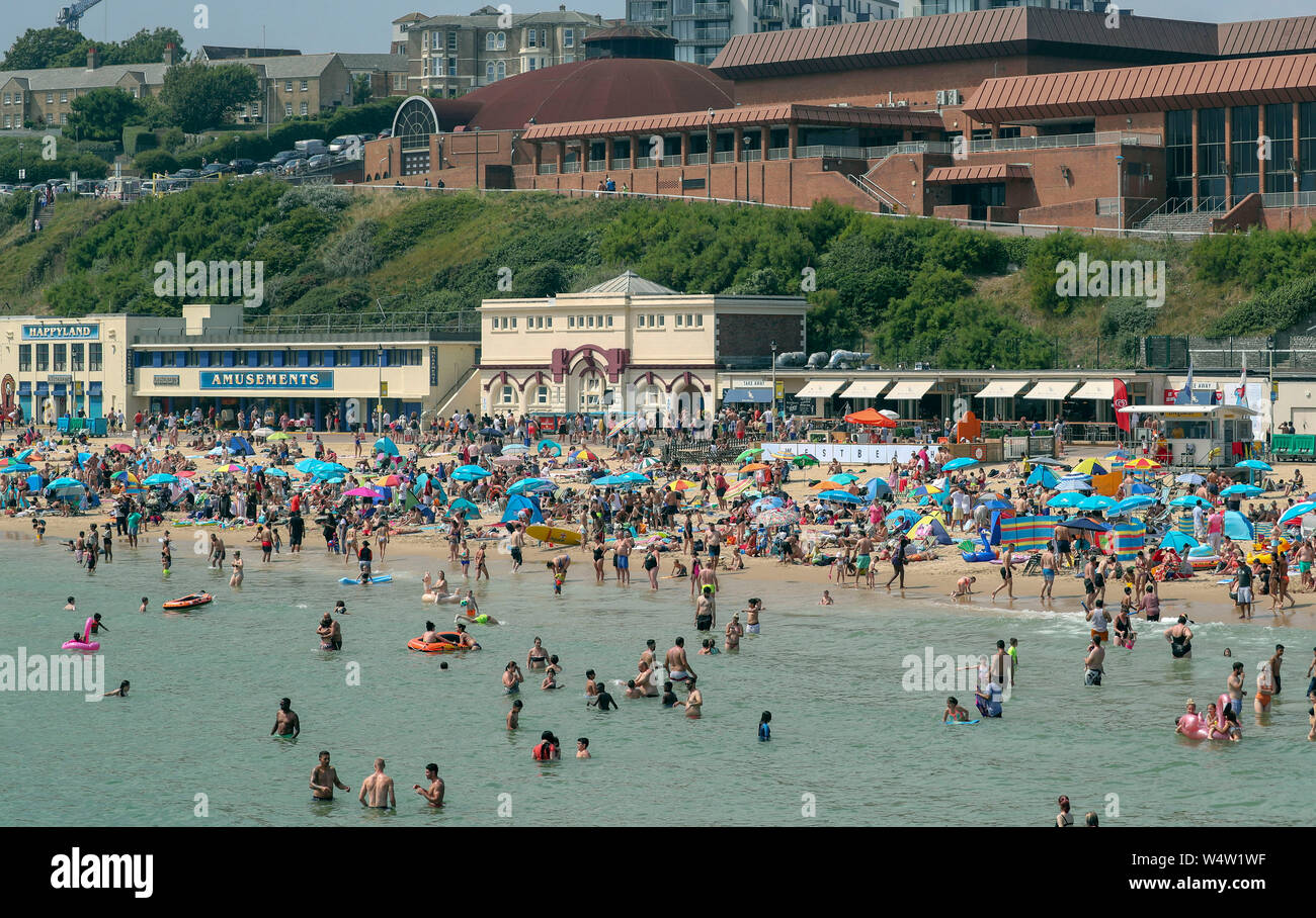 People enjoying the sun shine on Bournemouth beach as the UK has surpassed the hottest July day on record, with 36.9 degrees celsius being recorded at Heathrow. The all-time UK record of 38.5C (101.3F) recorded in Faversham, Kent, in August 2003, could be broken on Thursday, the Met Office said. Stock Photo