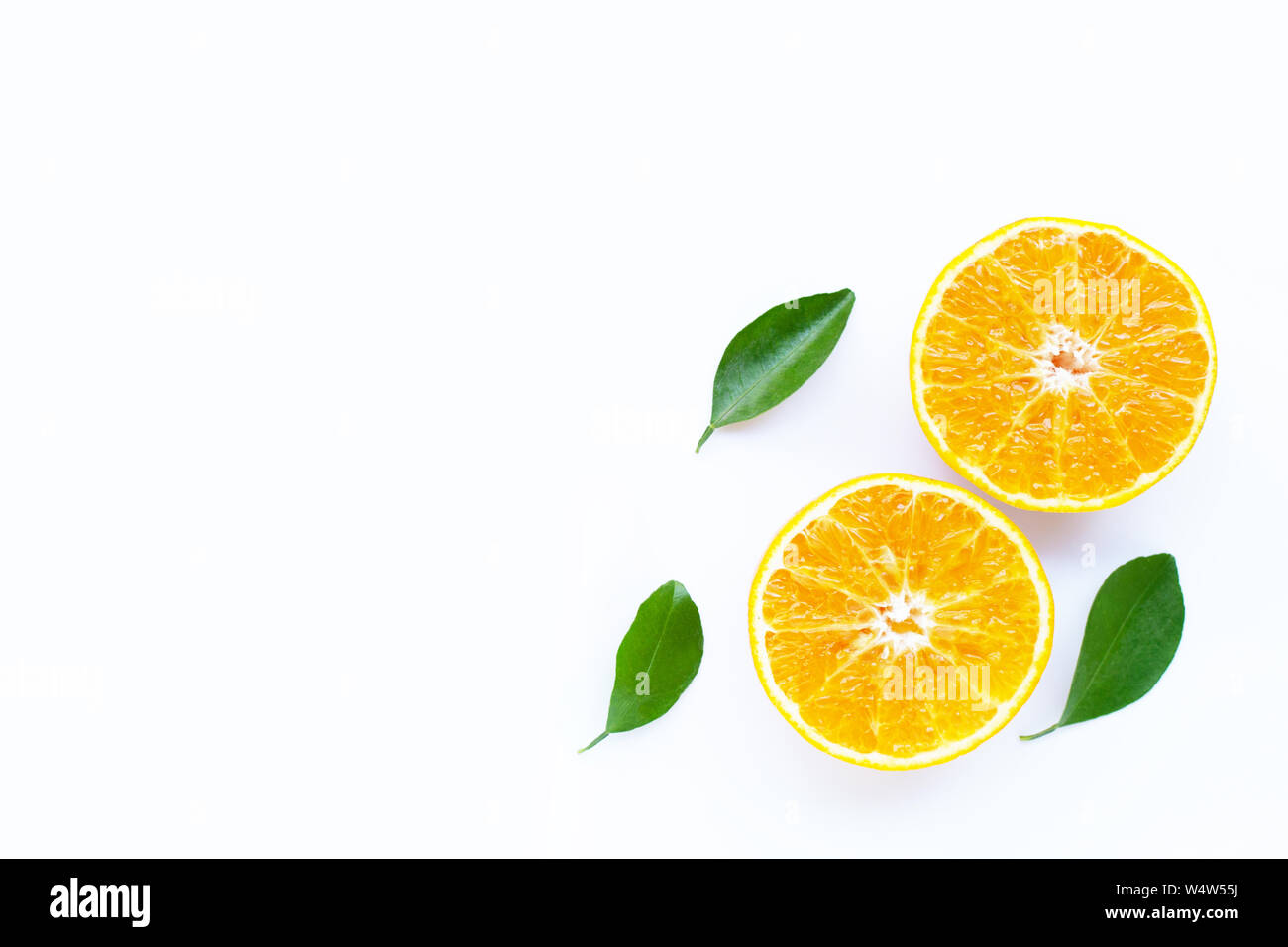 High vitamin C, Orange fruits with leaves on white background. Top view