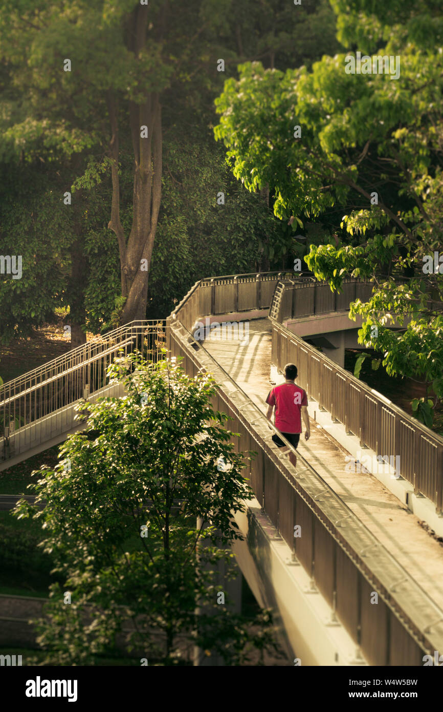 Pedestrain crossing overhead bridge at Yishun, Singapore Stock Photo