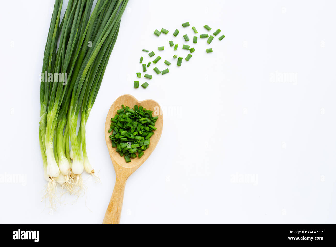 green onions isolated on white background Stock Photo - Alamy