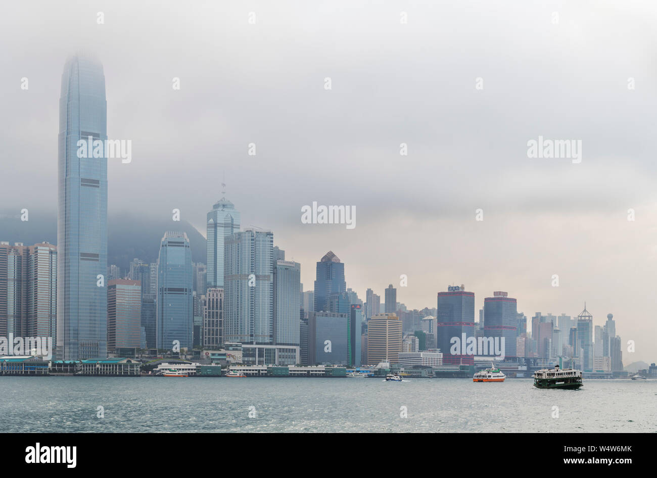 Hong Kong Harbour with Two International Finance Centre and Central skyline behind, Hong Kong Island, Tsim Sha Tsui, Hong Kong, China Stock Photo