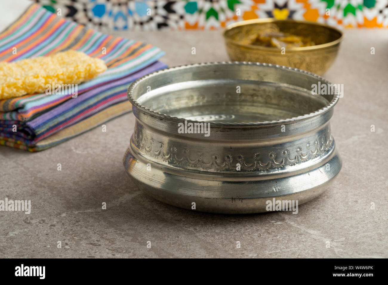 Decorated silver colored metal Hammam water bowl Stock Photo