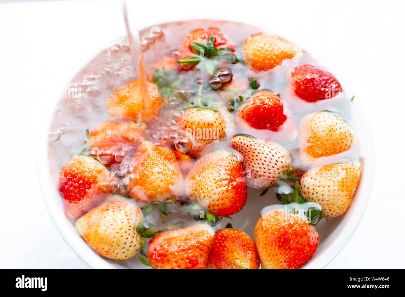 Washing fresh fruit hi-res stock photography and images - Alamy