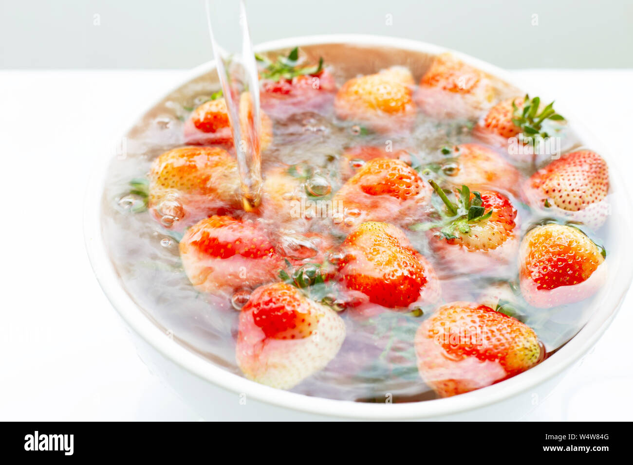 Washing fresh fruit hi-res stock photography and images - Alamy