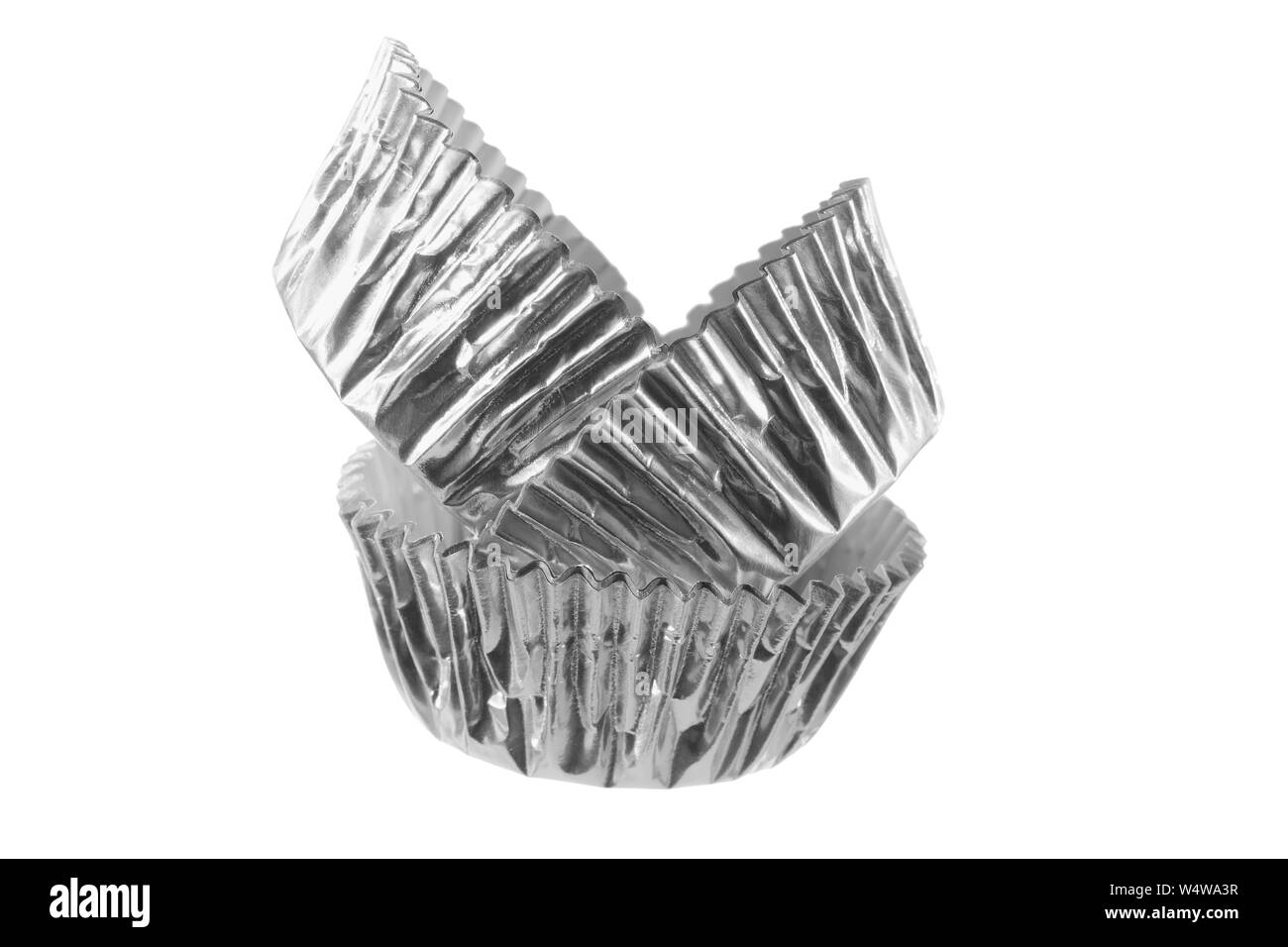 Stack of Cupcake Holders on White Background Stock Photo