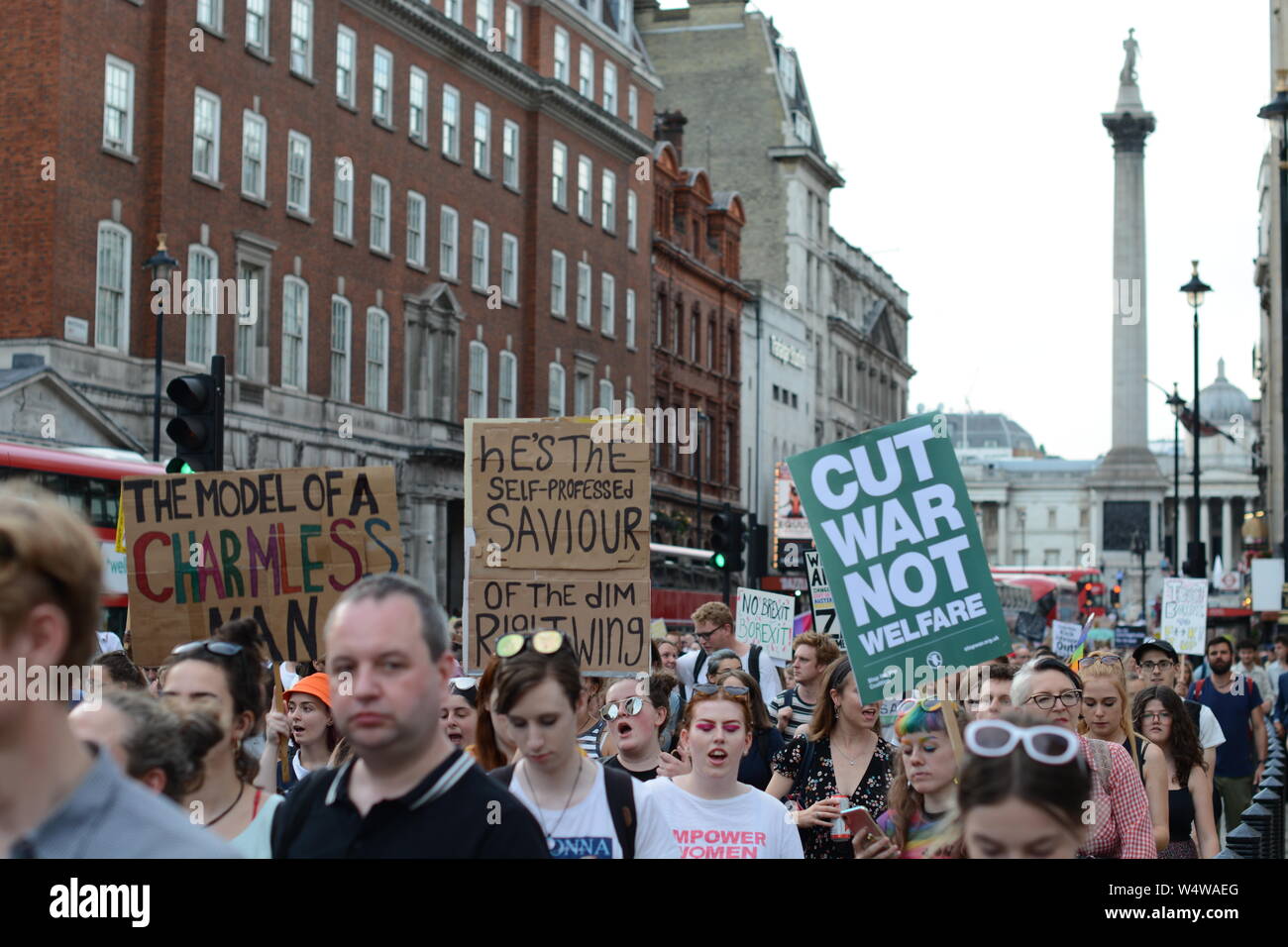 Anti-Boris protestors march past Nelson's Column down Parliament Street Stock Photo