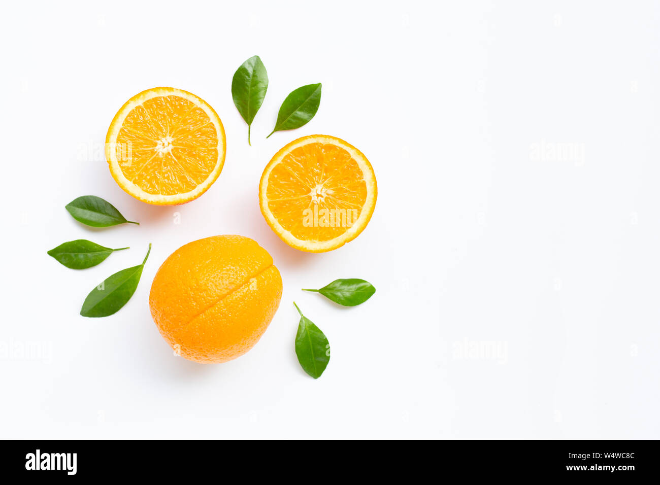 High vitamin C. Fresh orange citrus fruit with leaves isolated on white