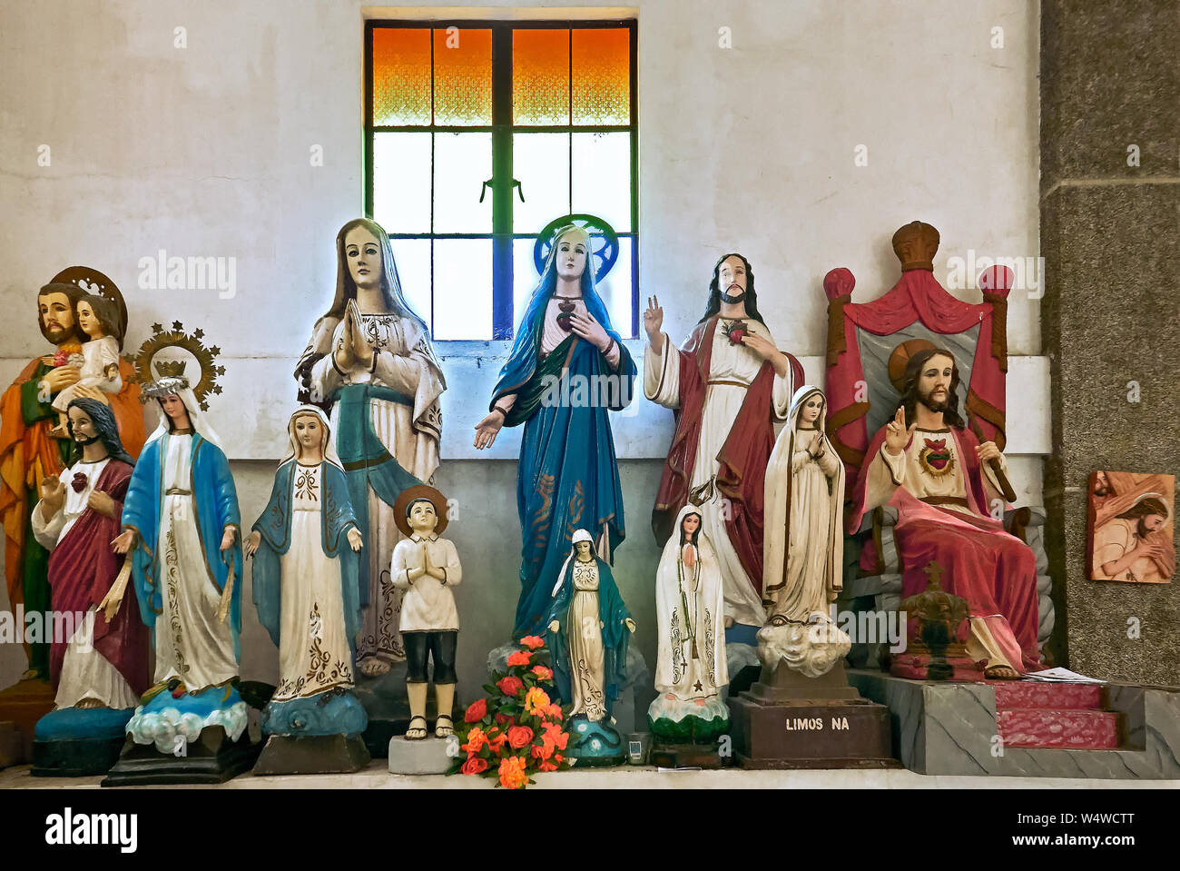 Various catholic sculptures of Mother Mary and Jesus inside the Parish church of San Antonio de