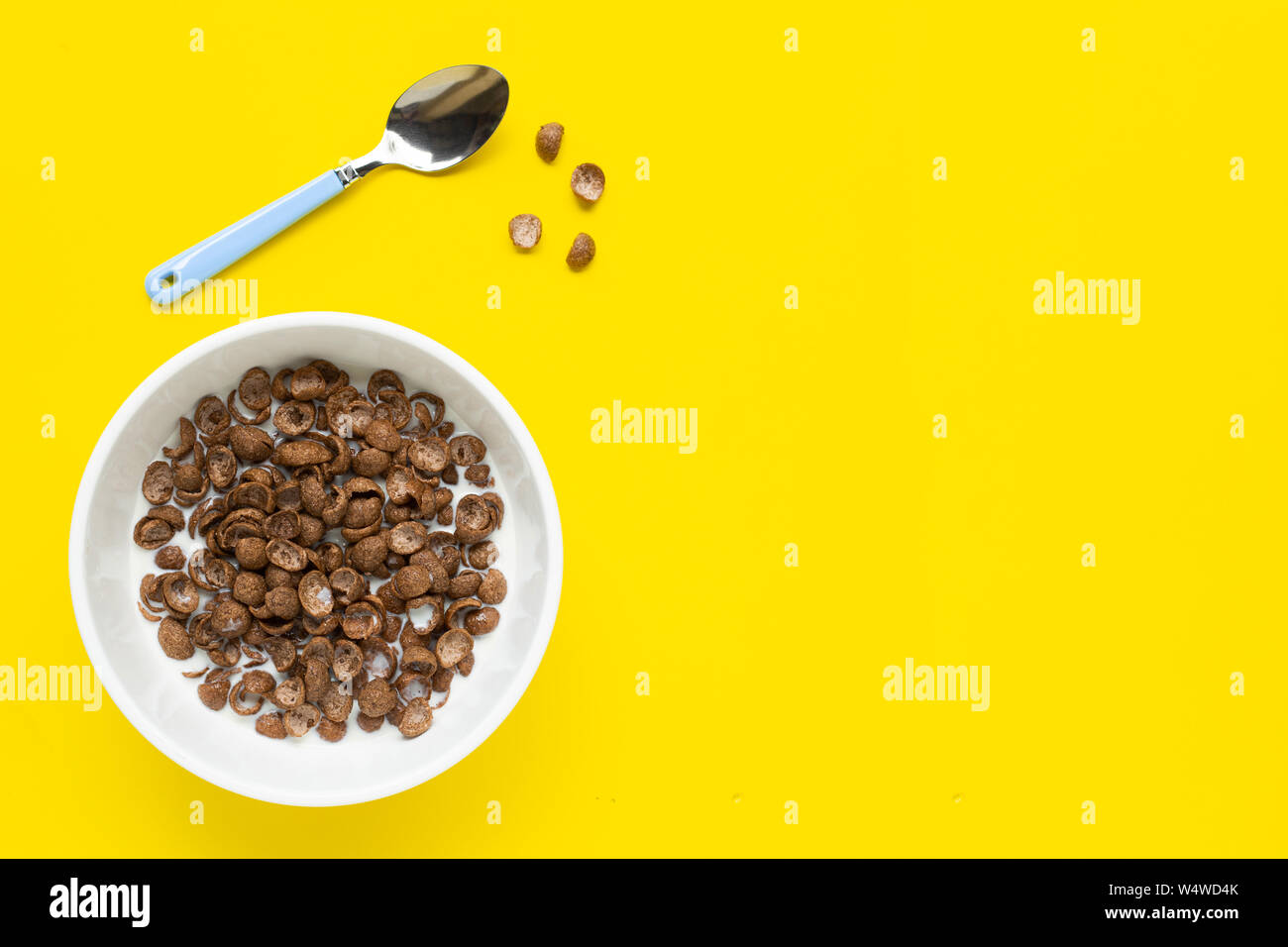Download Chocolate Cereal With Milk On Yellow Background Copy Space Stock Photo Alamy Yellowimages Mockups
