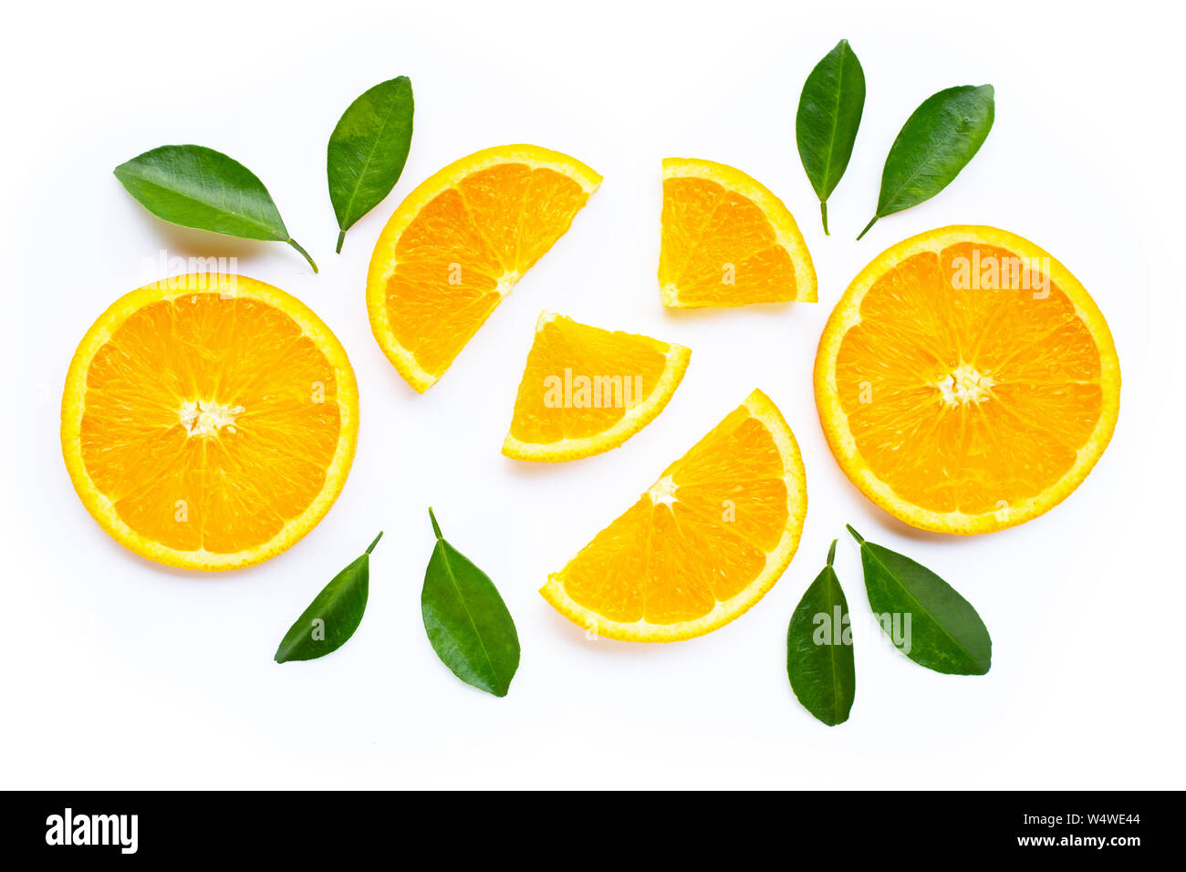 High vitamin C. Fresh orange citrus fruit with leaves isolated on white
