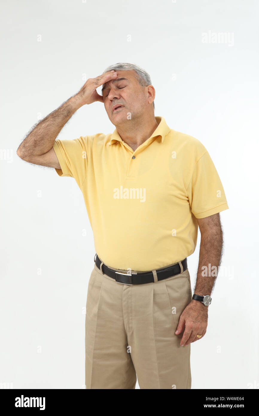 Old man suffering from headache Stock Photo