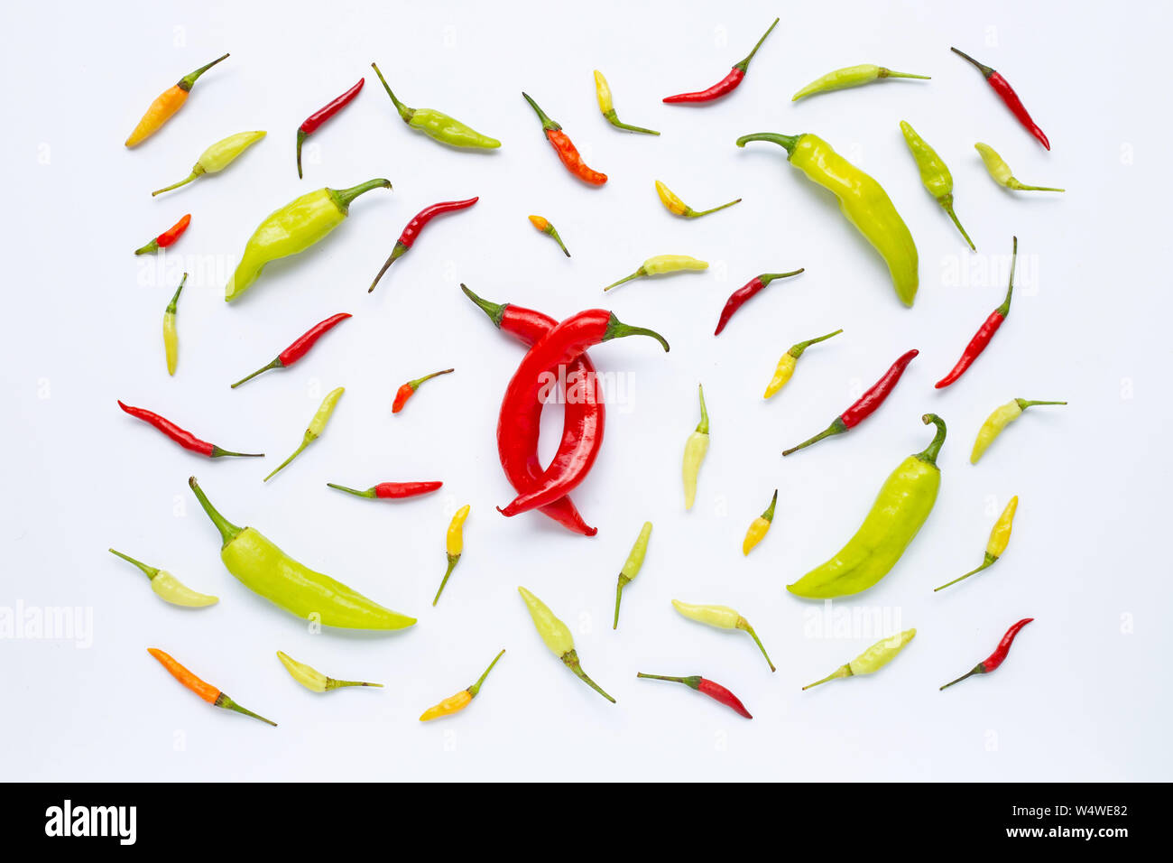 Chili Peppers on white background. Top view Stock Photo - Alamy