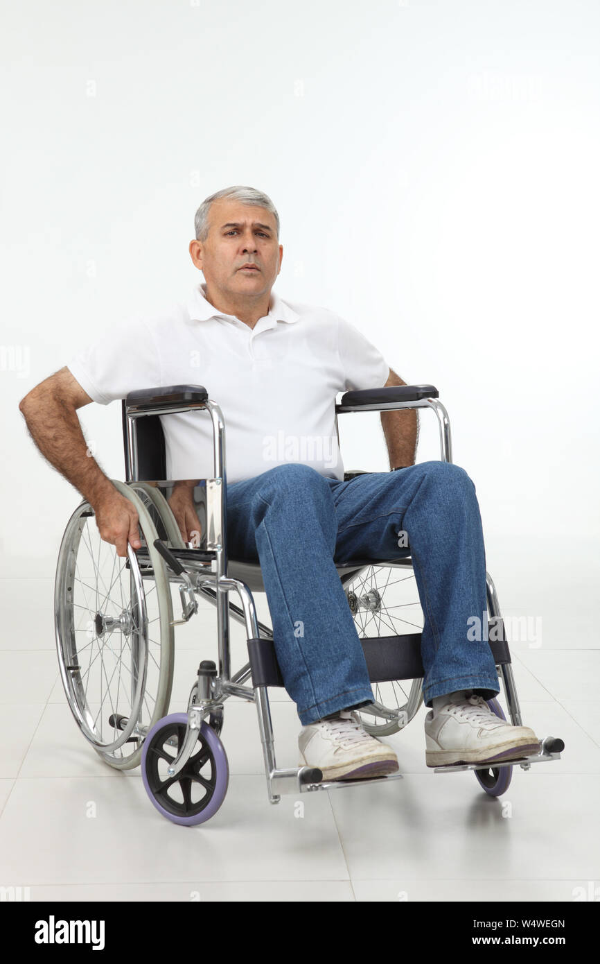 Old man sitting in a wheelchair Stock Photo - Alamy