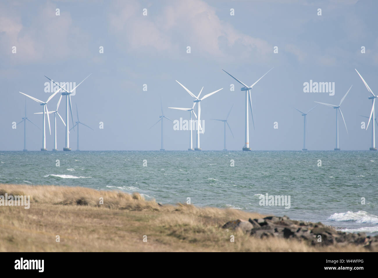Offshore Wind Farm in southern Denmark as seen from Rødbyhavn Stock Photo