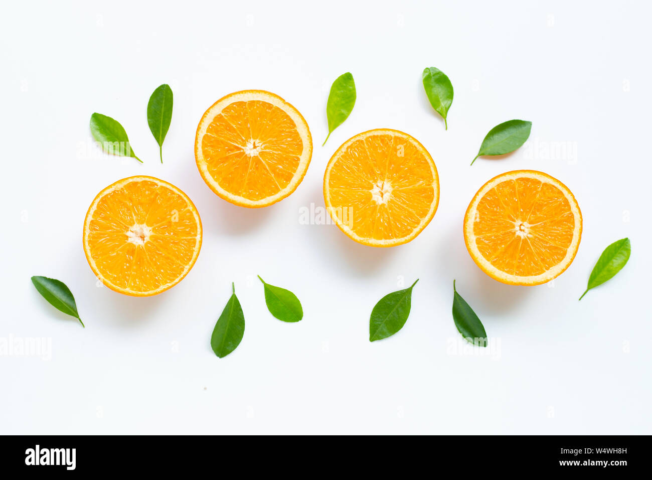 High vitamin C. Fresh orange citrus fruit with leaves isolated on white
