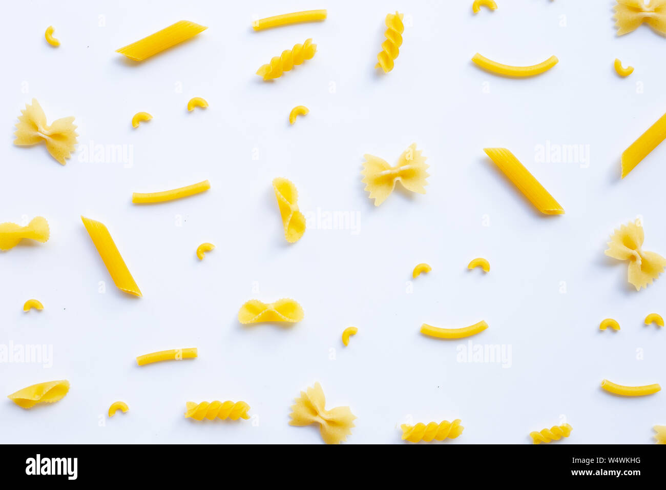 Different types of dry pasta on white background Stock Photo - Alamy