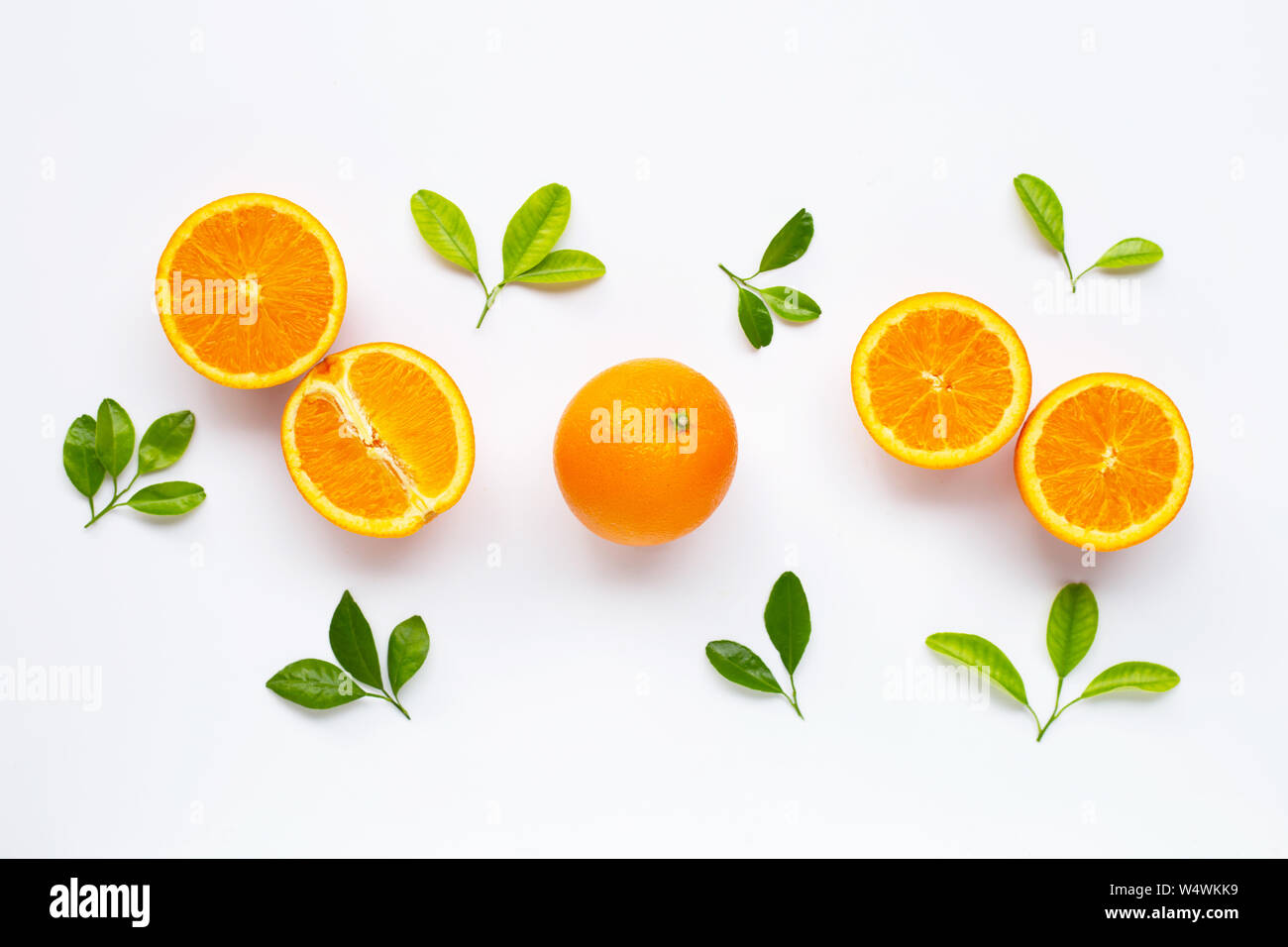 High vitamin C. Fresh orange citrus fruit with leaves isolated on white