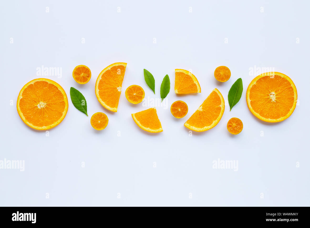 High vitamin C. Fresh orange citrus fruit with leaves isolated on white